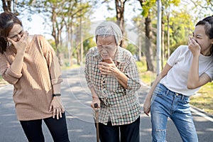 Sick senior woman has sneeze,allergic to weather,spreading germs with sneezing,contagious disease of influenza with a contaminated