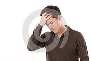 Sick, stressed man suffers from headache