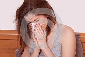 Sick Woman Caught Cold. Sneezing into Tissue. Headache