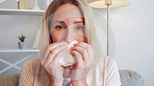 Sick woman flu symptom seasonal allergy sad lady
