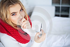 Sick woman with flu. Woman Suffering From Cold Lying In Bed With