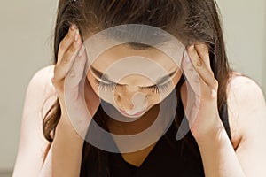 Sick woman with headache, migraine, stress photo