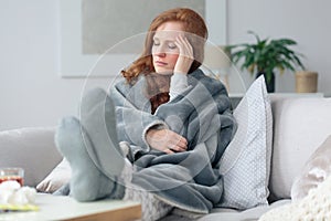Sick woman with headache photo