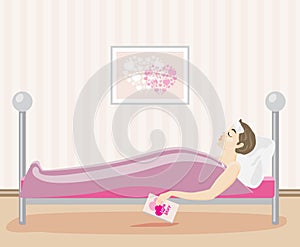 Sick woman lying in bed with a book in hand
