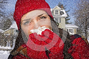 Sick Woman In Snow Blowing Her Sore Nose With Tissue