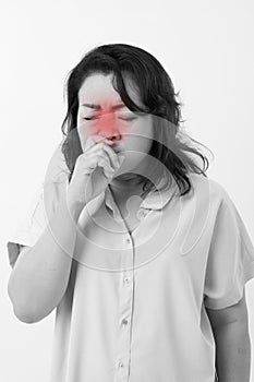 Sick woman suffering from runny nose