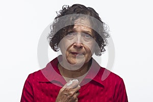 Sick woman with tissue, horizontal