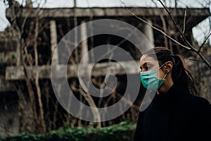 Sick woman wearing hygienic protective mask.Respiratory system infectious disease victim.Lethal lung disease.