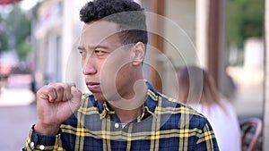 The Sick Young African Man Coughing Outdoor