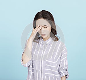 Sick young woman with headache