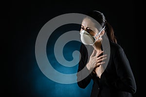 Sickness woman feel unwell wearing a face mask