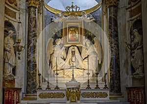 Side altar dedicated to Madonna holding Jesus in the Genoa Cathedral
