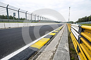 Side angle view of asphalt racing track photo