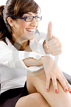 Side angle view of happy accountant with thumbs up