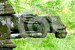 Gargoyle of a fountain of the chapel Saint Nicodemus in the village of PlumÃÂ©liau photo