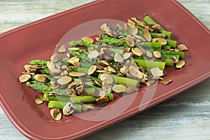Side dish of asparagus and toasted almond slices