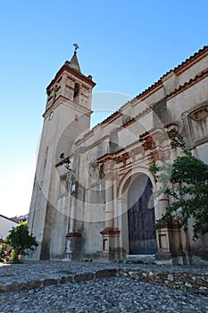 Side door and bell tower of the Church of San Juan Bautista, 18th century, Linares de la Sierra, Huelva, Spain