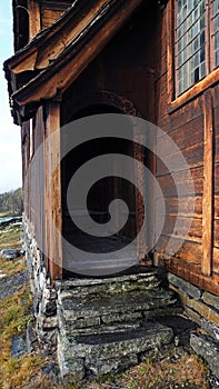Side door of Lomen stave church at Sildrefjord in Norway