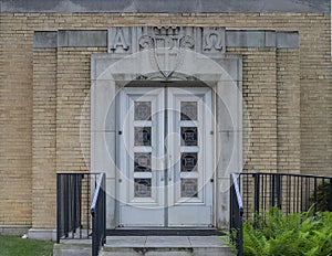 Side entrance to the narthex on the south side of Christ the King Church in Dallas, Texas.