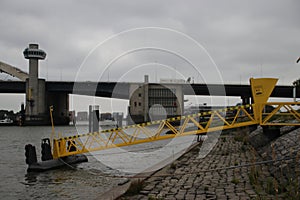 Side of the entry to the water taxi in Rotterdam at the van Brienenoordbrug bridge