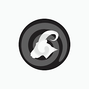 Side face billy goat isolated on black circle - goat, sheep, lamb logo emblem or button icon silhouette - mammal, animal vector ic