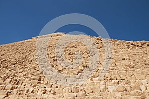 Side and faced top of  Pyramid of Khafre also read as Khafra, Khefren or of Chephren is the second-tallest and second-largest of photo