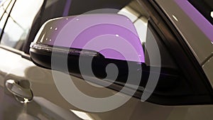 Side mirror of a modern car with backlight