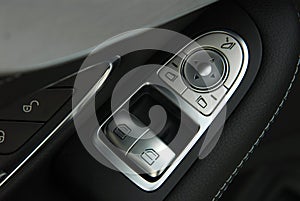 Side mirror switch control and window button