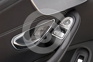 Side mirror switch control, window control, central locking and car door handles