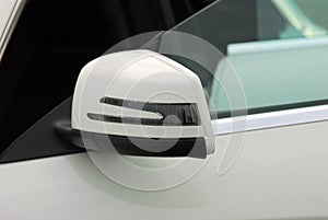 Side mirror with turn signal of a car