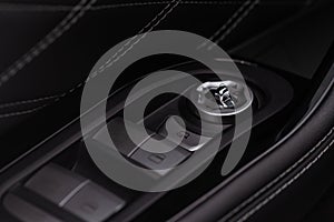 Side mirrors control panel on side door.