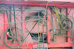 Side of Old Threshing Machine with belts