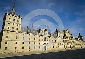 Side perspective view of the main faÃÂ§ade and entrance of the monasteries of San Lorenzo de el Escorial. photo