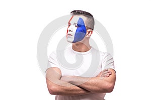 Side portrait football fan confident without emotion of France national team.
