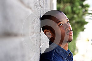 Side portrait of handsome black man staring