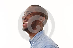 Side portrait of laughing african american man looking up