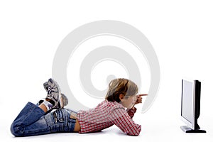 Side pose of boy watching screen