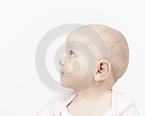 Side profile of a cute baby girl photo