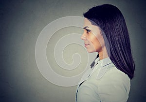 Side profile of a happy smiling young woman