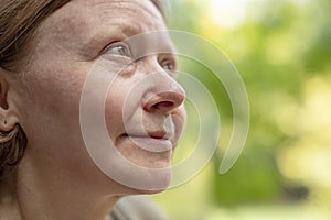 Side profile of a mature woman thinking