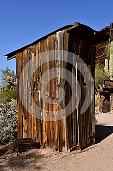 Old outhouse from browned cedar wood