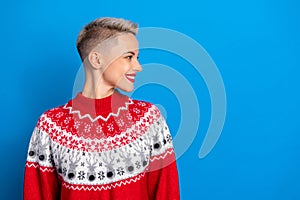 Side profile photo of young satisfied toothy beaming smiling xmas girl wear red sweater showing her new haircut isolated