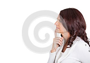 Side profile serious beautiful mature woman thinking