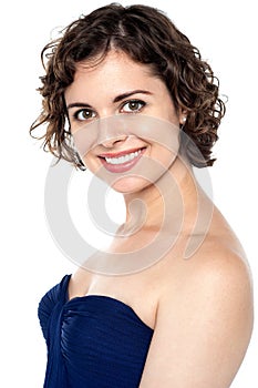 Side profile of a smiling model