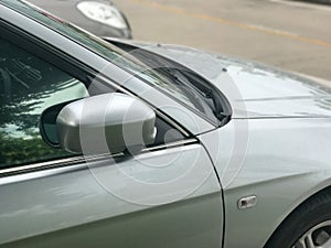 Side rear-view mirror on a car