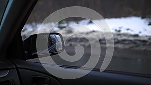 Side rear-view mirror of a modern car