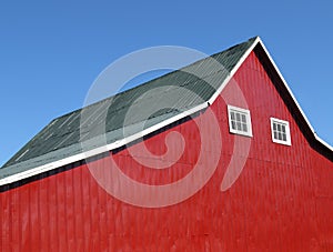 Side of a red barn.