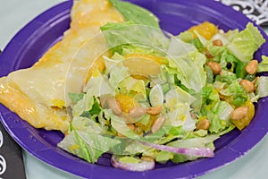 side salad with romaine lettuce, tangerines and peanuts with citrus dressing