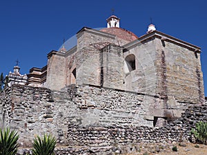 Side of San Pedro church in Mitla city at archeological site of Zapotec culture on Oaxaca landscape, Mexico