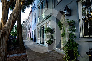 Side show of Rainbow Row houses with pot plants in Charleston, South Carolina